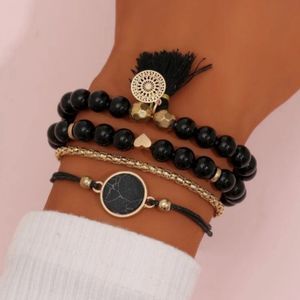 4 Piece Boho Tassel Bracelet Set!